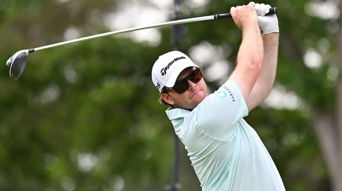 Harry Higgs plays a tee shot on the sixth hole during the final round of the RBC Canadian Open golf tournament.